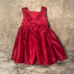 Used size 18-24 months red bow tie dress with detachable bow in the back.
